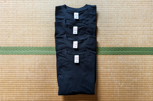 Black JA-101 Sample Pack with four T-shirts, sizes S to XL