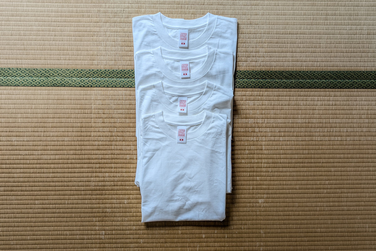 White JA-101 Sample Pack with four T-shirts, sizes S to XL
